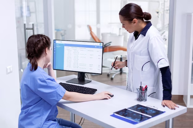 Doctors using a computer