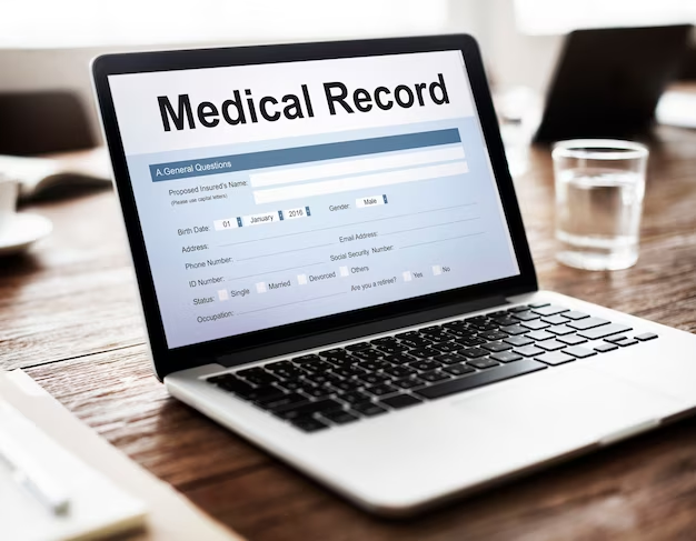 Laptop displaying 'Electronic Medical Record'